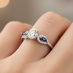 Round Brilliant Three-Stone Ring with Pear Sapphires