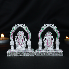 Silver Lakshmi Ganesh Idol Pair with Arch Design & Ruby-Emerald Stones