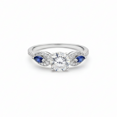Round Brilliant Three-Stone Ring with Pear Sapphires