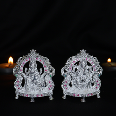 Silver Lakshmi Ganesh Idol Pair Seated on Ornate Silver Chair
